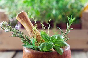 fresh herbs in a mortar