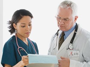 physicians reviewing medical records