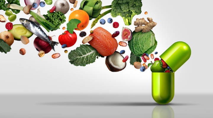 A capsule with nutrient-rich foods like vegetable, fruits and fish.